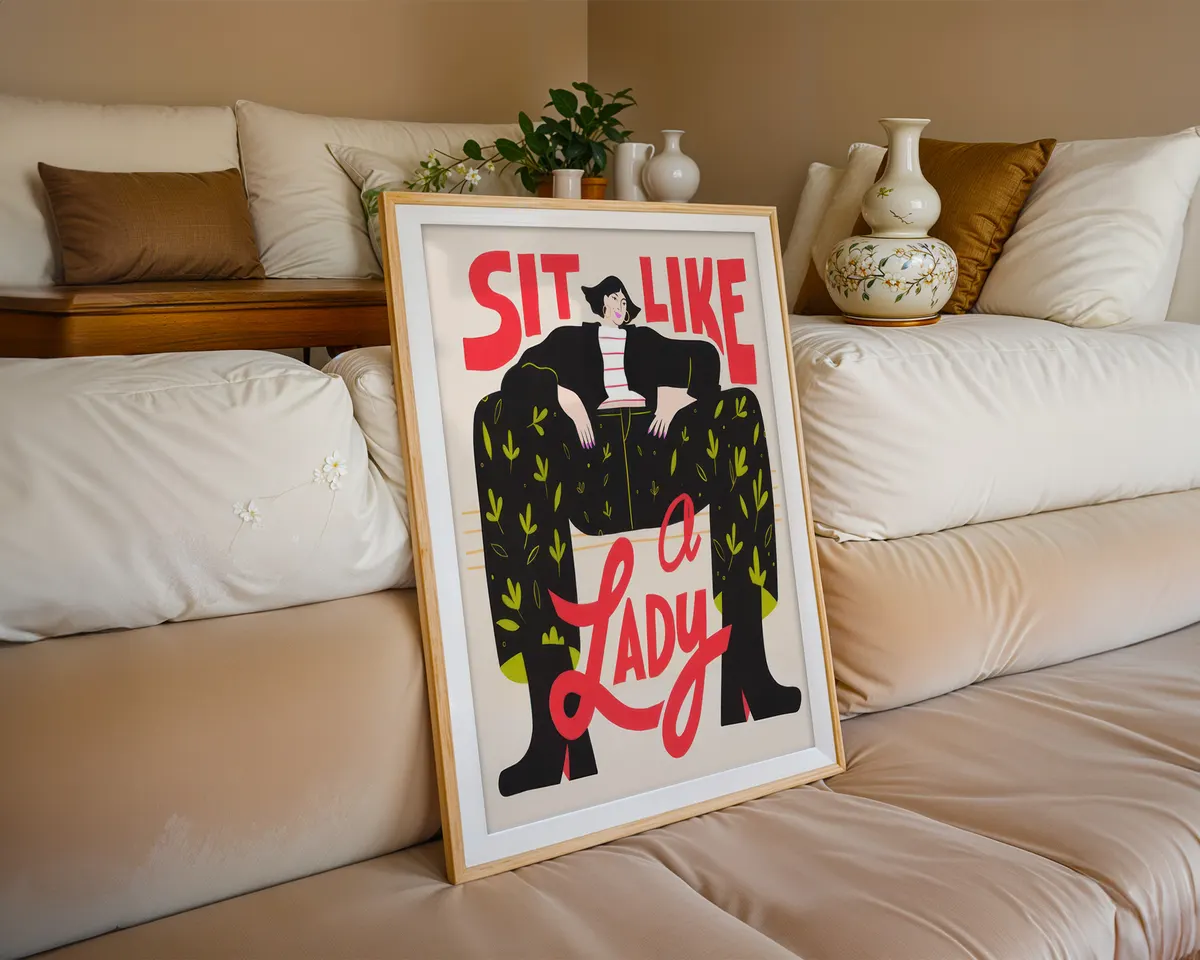 Bold feminist typography poster reading Sit Like a Lady with an illustrated seated woman in striking red, black and green. — photo 6